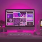 Website on computer with purple background